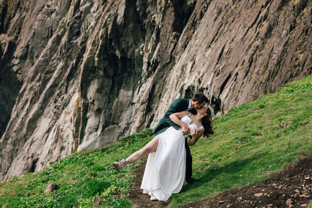 playful bride and groom during their pnw elopement along the coast