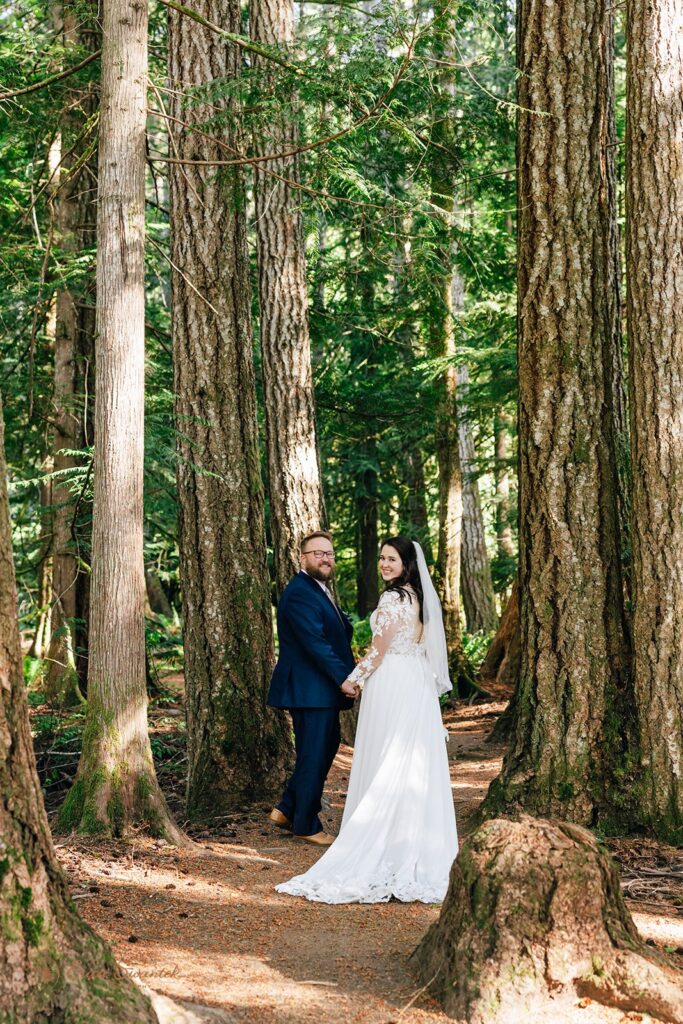 elopement couple in the forest during their PNW nature wedding day