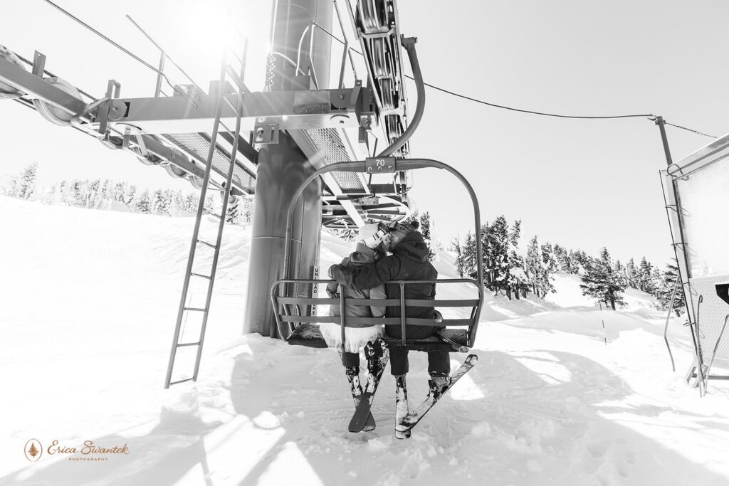 elopement couple kissing on a ski lift