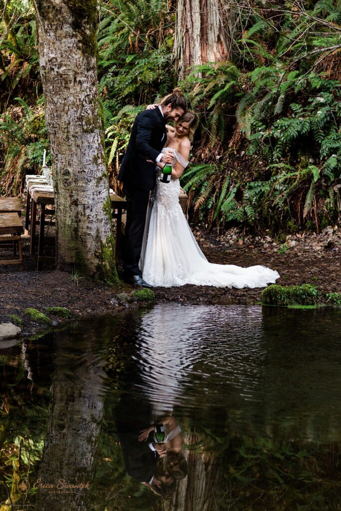 elopement couple snuggling during their winter elopement in the forest in pacific north west