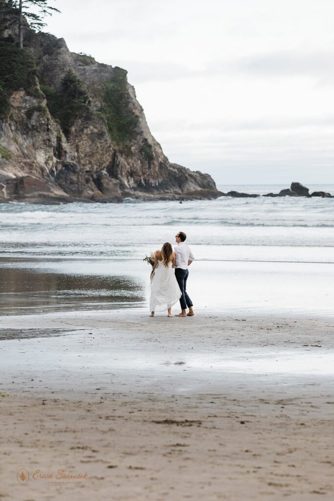 sweet elopement couple during their moody pnw coastal elopement