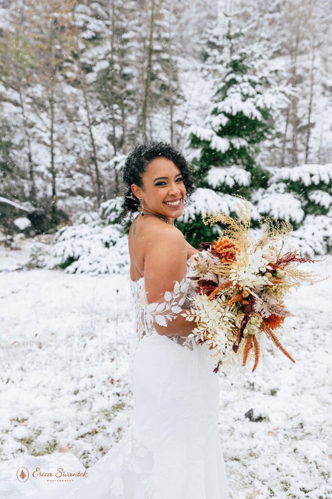 bride getting snowed on during a columbia river gorge elopement