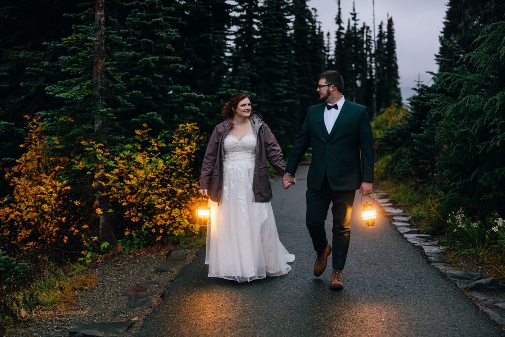 elopement couple surrounded by gorgeous fall landscapes in the forest