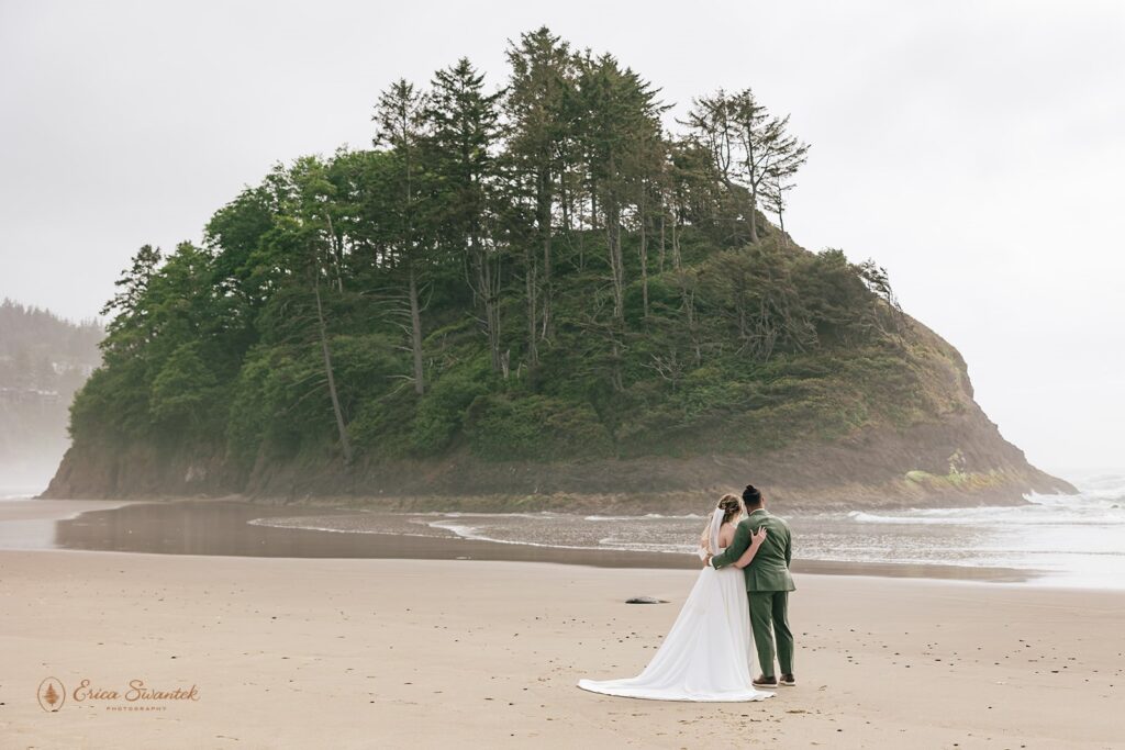 sweet elopement couple during their moody pnw coastal elopement