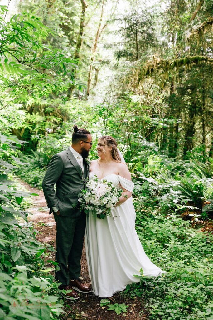 elopement couple surrounded by the forest