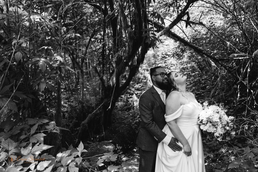 elopement couple in a lush forest during a pnw elopement