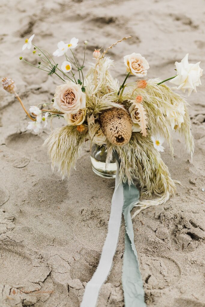 boho elopement florals set up on the oregon coast for an elopement ceremony