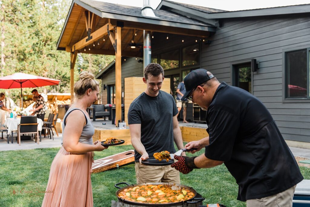 private chef preparing a meal for a small backyard elopement reception