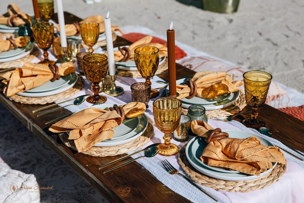 colorful elopement picnic set up on the oregon coast